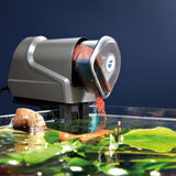 OASE FishGuard dispensing food into aquarium